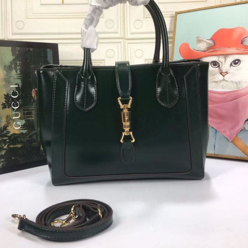 G*u*i shopping bags